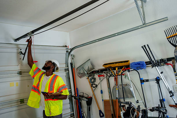 Professional Garage Door Roller Replacement technician working in Carle Place, NY
